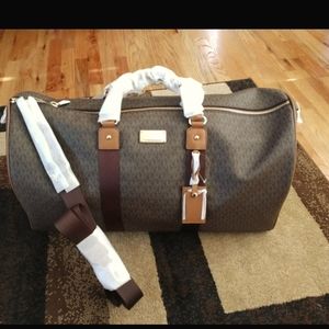 Sold on mercari MK travel luggage